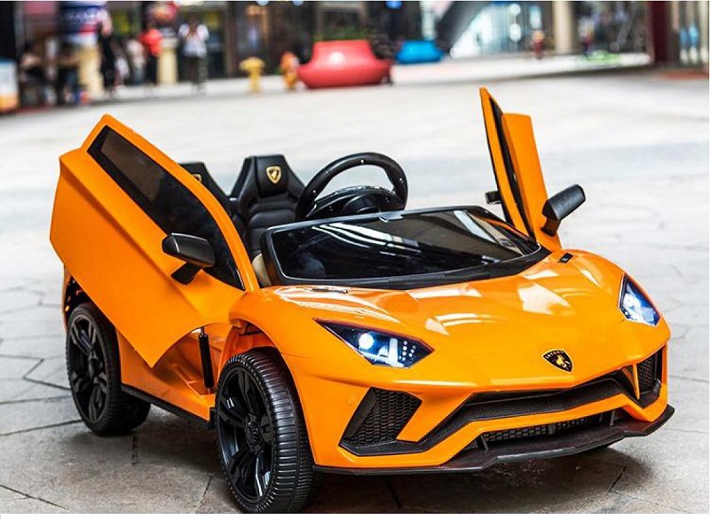 Xe ô tô điện trẻ em Lamborghini LT 998 màu cam sáng, sang trọng nổi bật. Siêu xe đích thực cho các bé yêu